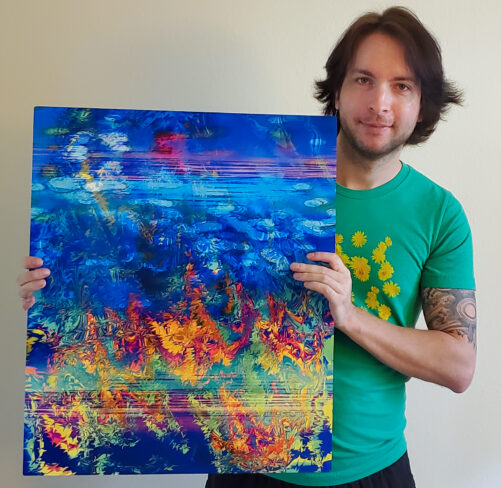 Perplexia artist Ethan James Hulbert holding Aquatic Ambience as an aluminium print.